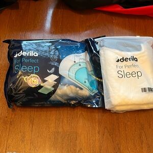 Oderila ergonomic pillow and 3 pillow cases. Brand new!